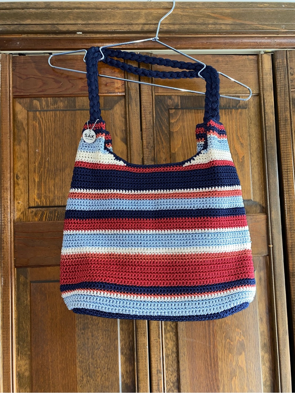 The Sak Navy, Red, White & Light Blue Striped Crochet Bag with braided handles